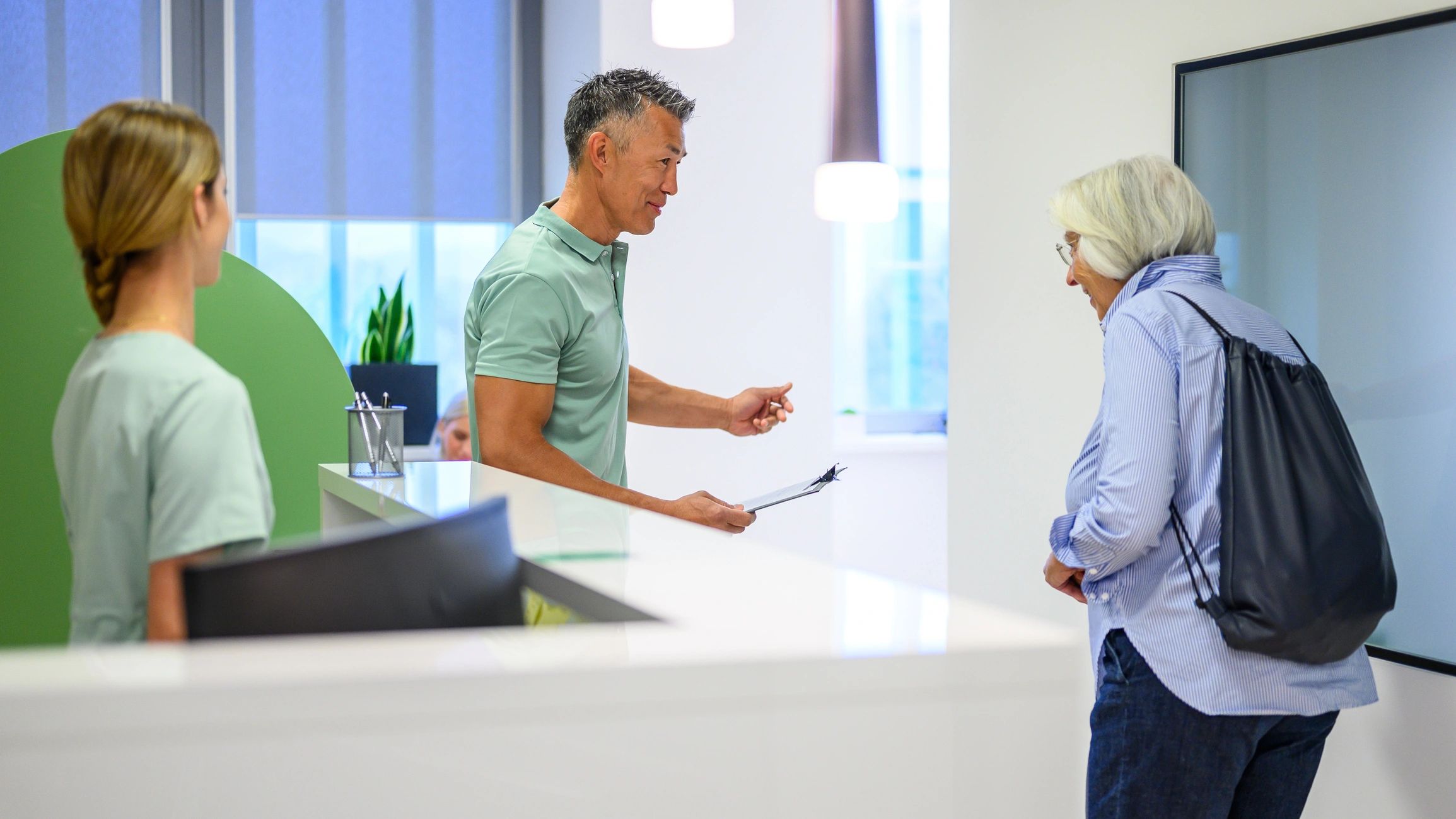 Healthcare professional consulting with a patient